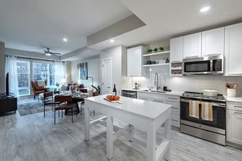 Sleek ash-grey plank flooring in living areas